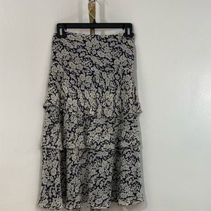 Skirt navy and white.